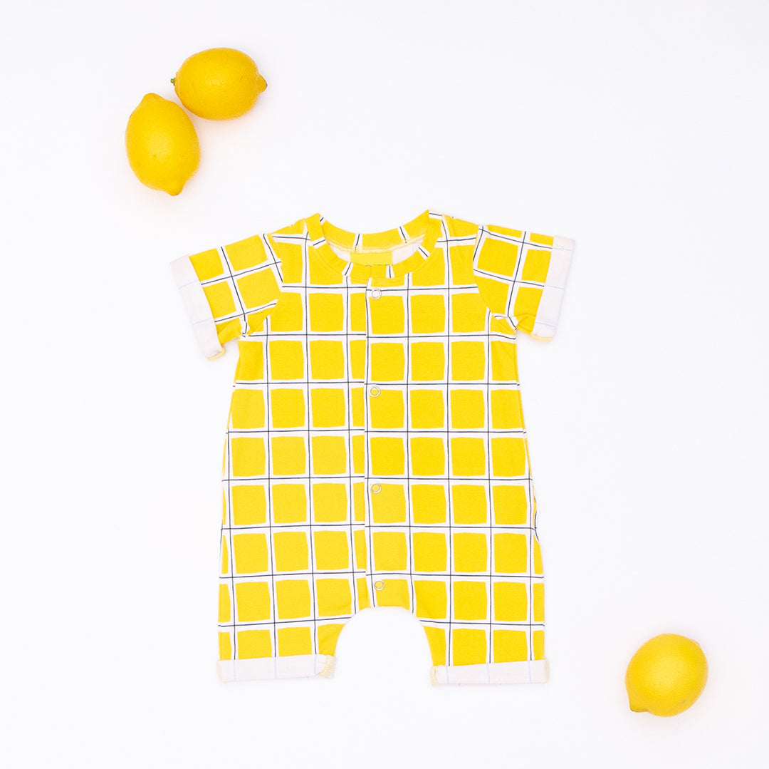 Yellow Check Romper from the baby and kids clothing collection at Pickle UK.