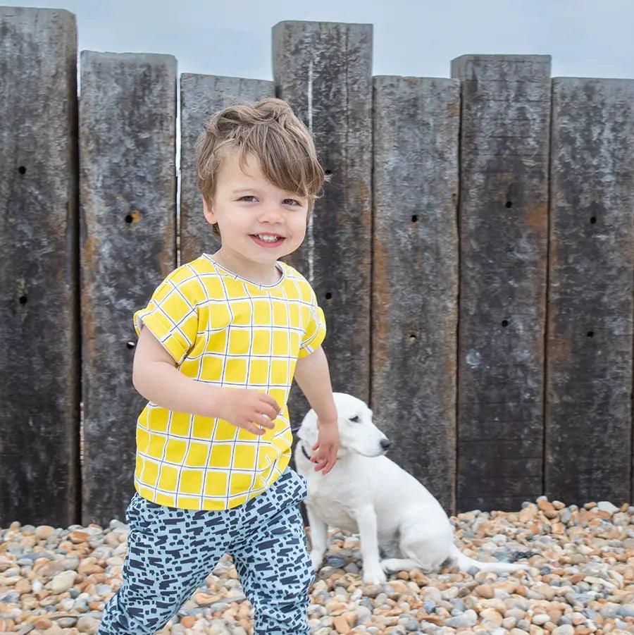 Yellow Check Unisex T-shirt from the baby and kids clothing collection at Pickle UK.